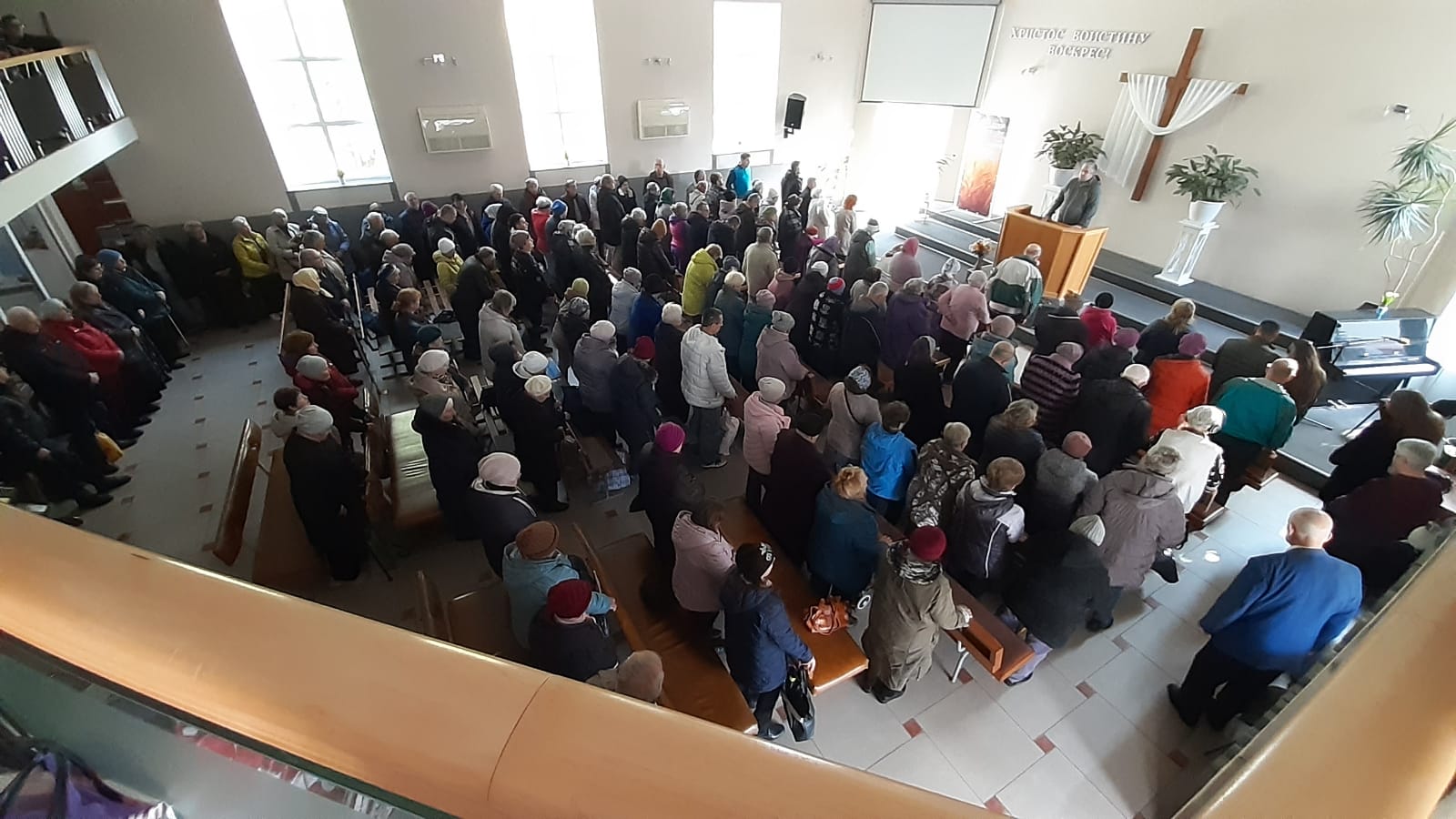 Congregation standing in church
