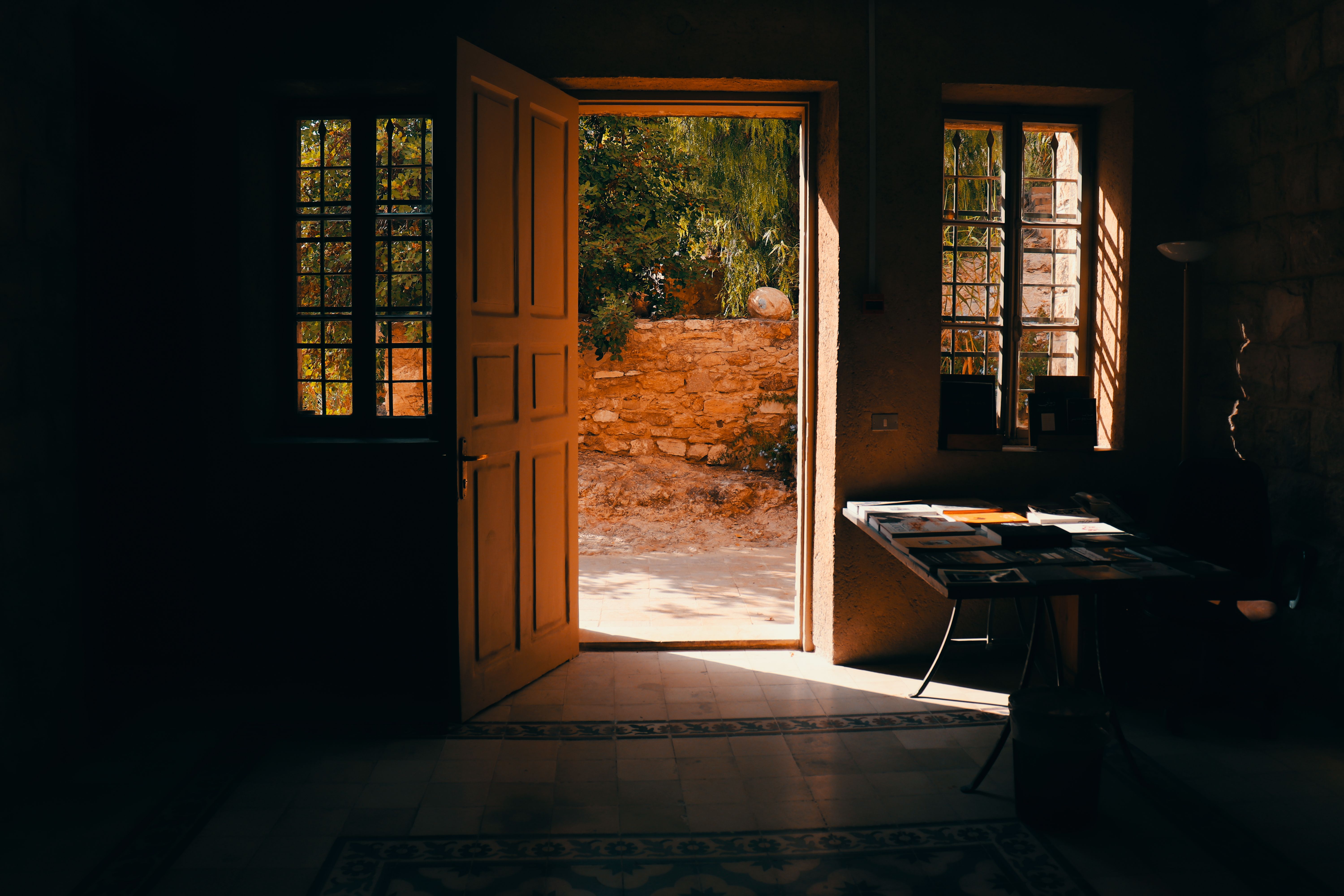 Sunlight streams through an open door